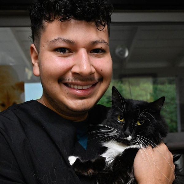 man holding his cat